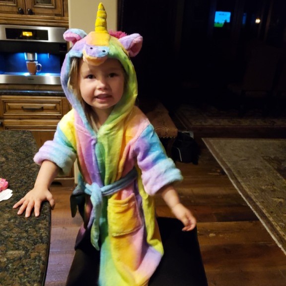 Brian's granddaughter in a unicorn robe